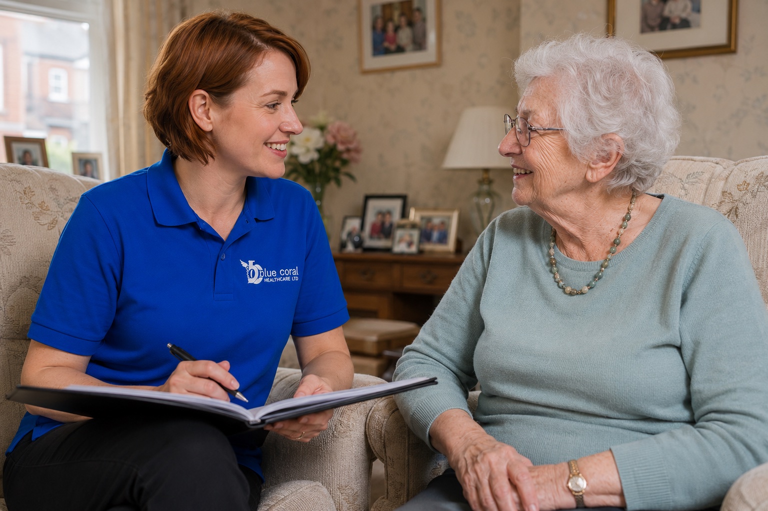 Blue Coral Healthcare carer discussing a bespoke, personalised care plan with an elderly woman across the UK